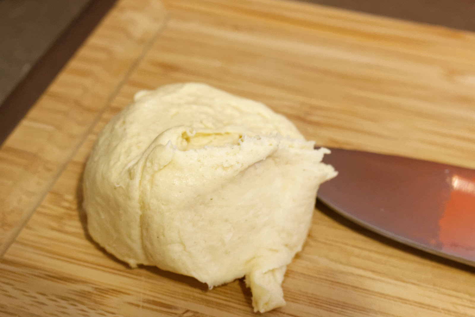 Pillsbury Crescent roll cut Pillsbury Crescent roll cut next to a knife